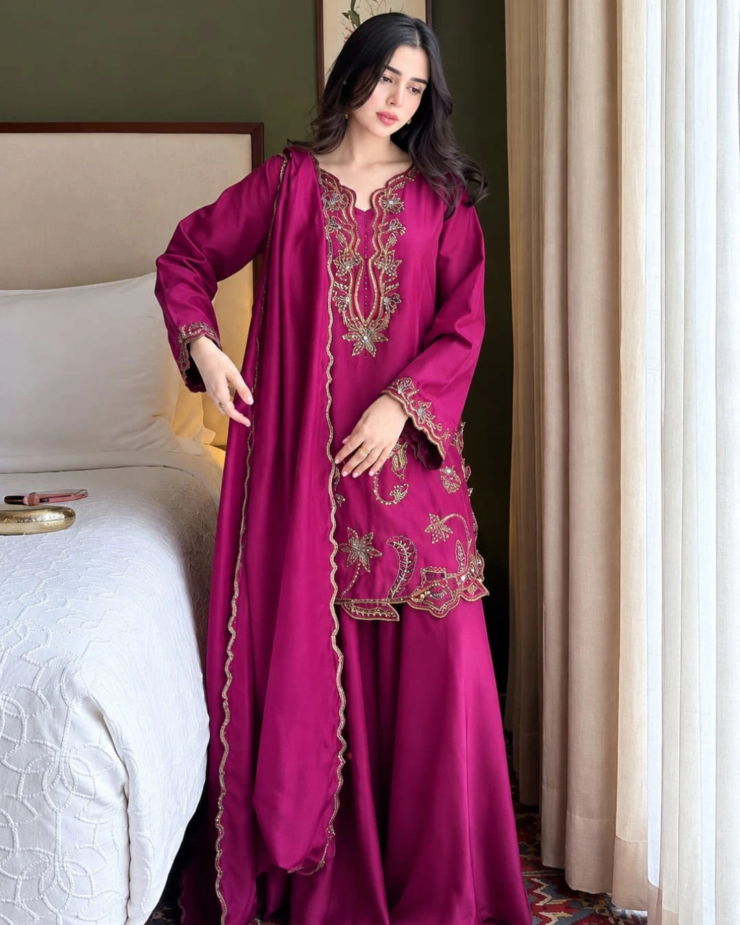 Royal plum Pakistani suit with intricate golden floral embroidery and chiffon dupatta