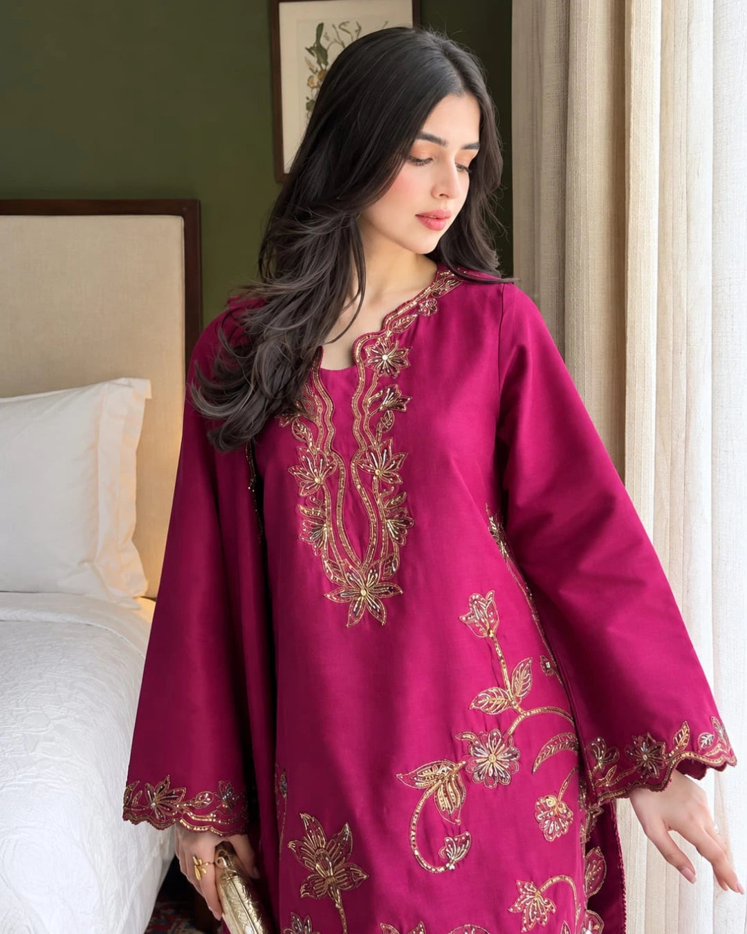 Women's plum Tussil Silk formal suit with embroidered neckline, sleeves, and plazo trousers.