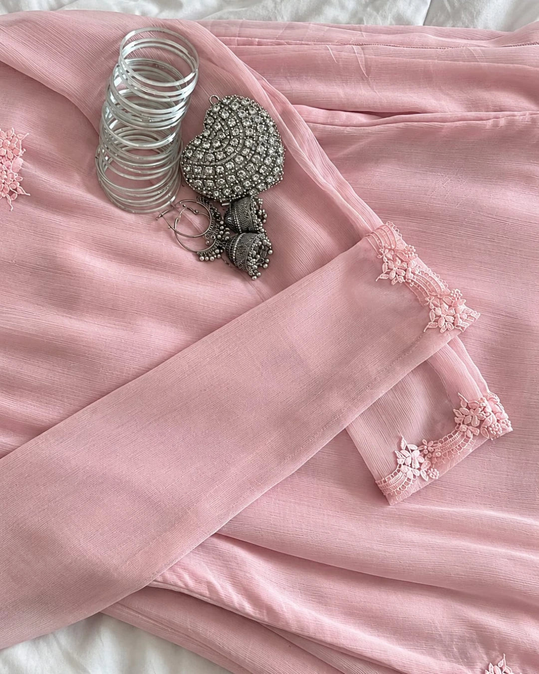 Aurelia Pink long chiffon shirt with intricate lace hem detailing.