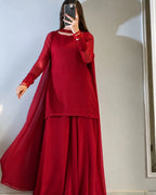 Elegant maroon red three-piece sharara suit for festive occasions.