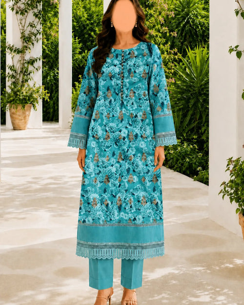 Woman wearing a turquoise embroidered outfit in an outdoor setting